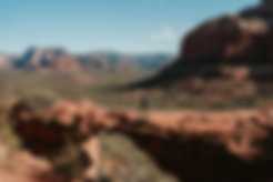 Crossing the natural bridge in Sedona Arizona